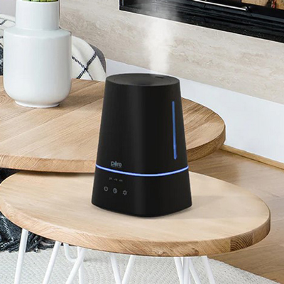 PURE ENRICHMENT<sup>&reg;</sup> Hume Max Humidifier  - Breathe comfortably in a moisturized home with this ultrasonic humidifier with 3 mist settings. The true top fill design takes the mess out of refills and the 1-gallon capacity spends more time keeping your home at the ideal climate for up to 30 hours. Add an essential oil of your choosing to take advantage of the built-in oil diffuser and create a luxurious space catered just for you.
